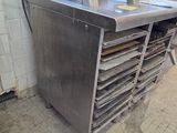 an image of a commercial kitchen with a large mixer on the counter
