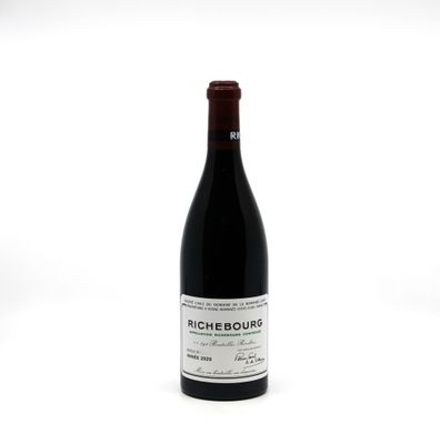 a bottle of wine that is sitting on a table