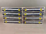six blue and yellow train cars stacked on top of each other