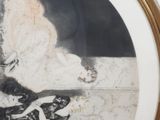a picture of a painting of a woman sitting on a bed