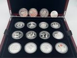a box of silver coins that are in a case