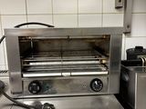 a toaster that is sitting on a counter in a kitchen