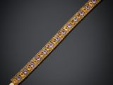 un bracelet en or serti d'améthyste et de diamants