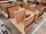 many pieces of wood that are sitting on the floor
