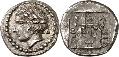 a silver coin with an image of a man on it