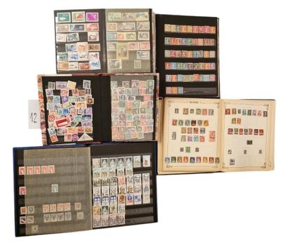 a lot of different stamps on display in a book