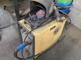 a machine that is sitting next to a table
