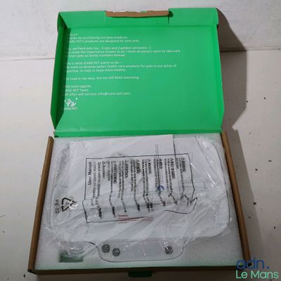 une boîte verte contenant des instructions à l'intérieur
