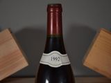 a bottle of wine that is sitting on a table
