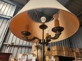 a lamp that is sitting on a table in a warehouse