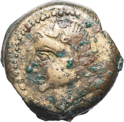 an ancient coin with a woman ' s face on it