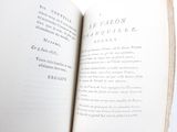 an open book that is sitting on a table