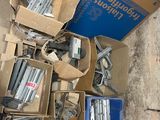 a pile of boxes and tools on the ground