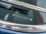 a close up of a car ' s windshield with a sticker on it