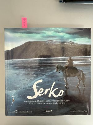 a book with a picture of a man riding a horse