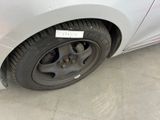 a close up of a car tire with a sticker on it