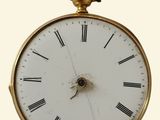 un gros plan d'une horloge comportant des chiffres romains