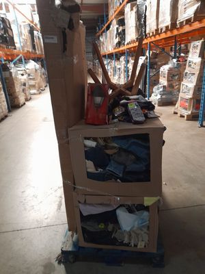 a cart that has some boxes on it in a warehouse
