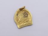 an image of a gold coin with a sun on it
