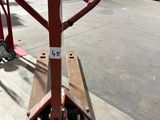 an image of a fork lifter in a warehouse