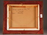 an old picture frame with a note written on it and a pen in it