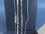 a picture of a display case that has some chains attached to it