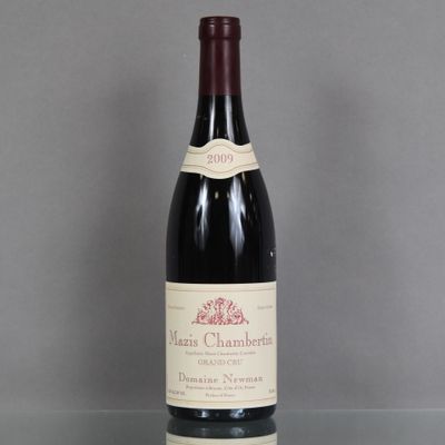 a bottle of wine that is sitting on a table