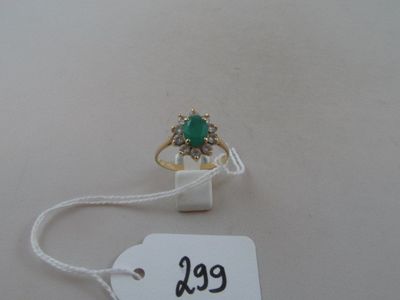 a ring with a green stone on it and a price tag