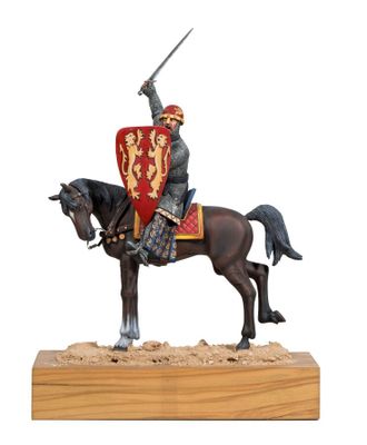 statue of a knight on a horse with a sword and shield