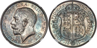 a close up of a coin with a man ' s face on it