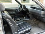 a picture of the inside of a car with the door open