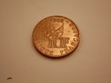 an image of a coin that is on a table