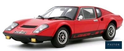 the red sports car is parked on a white surface