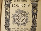 an old book with a picture of a sun in the middle of it