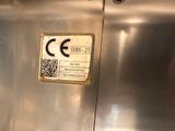 an image of a metal elevator door with a qr code on it