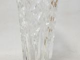 a glass vase that is sitting on a table