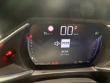 the dashboard of a car with a digital display on it