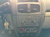 a car dashboard with a bunch of keys in it