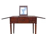 a laptop computer sitting on top of a wooden desk