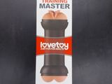 the back of a box with a black dog toy inside of it