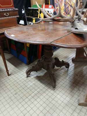 an image of a table and chairs in a room