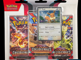 two packs of pokemon trading cards are in a package