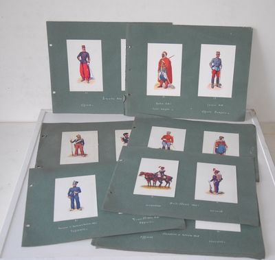 several cards of different types of uniforms are displayed on a table