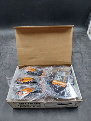 a box of assorted items in it on the floor
