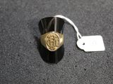 a ring that has a picture of a person on it