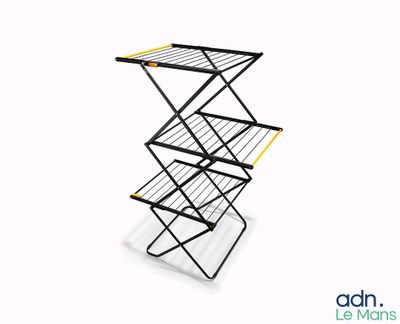 a close up of a three tier drying rack on a white background