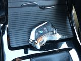 a cell phone that is sitting in the back seat of a car