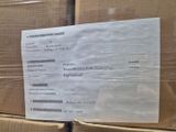 a lot of boxes stacked on top of each other in a warehouse