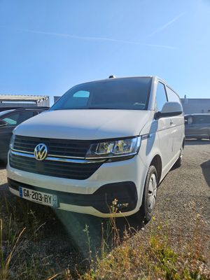 a white van parked on the side of the road
