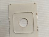 a picture of a white box with a hole in it